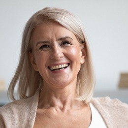 Woman with dental implants in Arlington