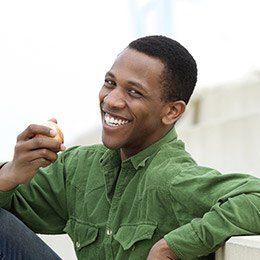 Man with dental crowns in Arlington 