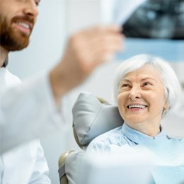 patient visiting dentist for checkup 
