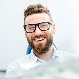 Man smiling with dental implants in Arlington