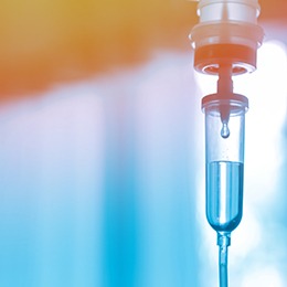 An IV solution dripping through a tube