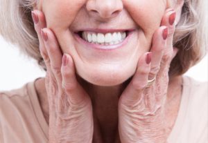 Smiling face wearing dentures