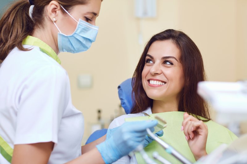 woman inquiring about cosmetic dentistry